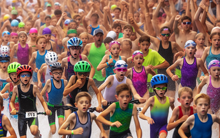 Kids swim, bike and run in DeWitt youth triathlon