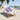 'Dear Santa, I Trained' beach towel on a beach chair